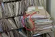 A stethoscope on top of patient's files at a GP Practice nea