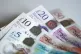 A view of £5, £10, £20 and £50 bank notes