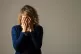 A woman showing signs of depression (picture posed by a mode