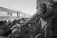 Then US president-elect Jimmy Carter leans over to shake han