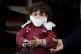 A Palestinian child wears a face mask as a precaution for th