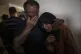 Relatives of 11-year-old Hussain Hamad, who was killed by an