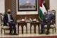 Palestinian President Mahmoud Abbas (right) meet with Britai