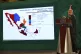 Mexican President Andres Manuel Lopez Obrador shows the poli