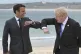 Prime Minister Boris Johnson clashes elbows with French Pres