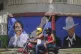 A motorcyclist rides past a mural of Nicaraguan President Da
