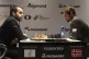 Norway's World Chess Champion Magnus Carlsen, right, compete