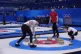 Britain's Jennifer Dodds directs Bruce Mouat, as he sweeps t