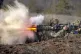 A Ukrainian serviceman fires an anti-tank weapon during an e