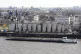 A tank ship passes tanks at the harbor in Hamburg, Germany, 