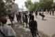 Security forces as they fire teargas at protesters demanding