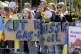 Demonstrators demanding an embargo on Russian oil during a p