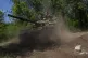 Ukrainian military maneuvering a tank near the frontline in 