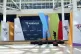 Workers prepare a stage in preparation for the Summit of the