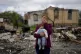 Nila Zelinska holds her granddaughter's doll that she recove