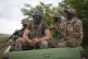 Soldiers of Ukraine's special operations unit sit in the car