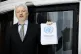 Wikileaks founder Julian Assange speaks on the balcony of th