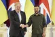 Ukrainian President Volodymyr Zelenskyy (right) and outgoing