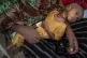 Hamdi Yusuf, a malnourished child, is held by her mother in 