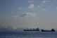 Cargo ships anchored in the Marmara Sea await to cross the B