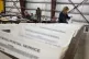 Fran Kimmel sorts ballots at the Flathead County Fairgrounds