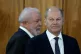 DIFFERENT PATHS: German Chancellor Olaf Scholz arrives with 