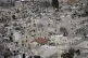 Smoke rises as Israeli forces raid the occupied West Bank ci