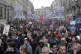 Protesters march during a demonstration Tuesday, March 28, 2