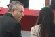 Daniel Urresti speaks with his lawyer Vanessa Alfaro as he a