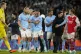 Manchester City's Kyle Walker (centre) celebrates with teamm