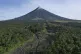 Mayon volcano belches hot emissions down its slope as seen f