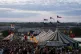 Festival goers walk through the site at the Glastonbury Fest