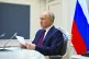 Russian President Vladimir Putin attends a meeting of the Sh