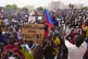 Nigeriens participate in a march called by supporters of cou
