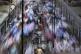 Women rest on a bench at the churchgate railway station duri