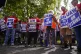 United Auto Workers members and supporters picket outside a 