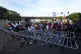 Demonstrators pull down a barricade during a protest against