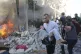 Palestinians rescue survivors after an Israeli strike on Raf