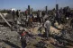 Palestinians search for bodies and survivors in the rubble o
