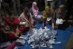 Bangladeshi polling officials count votes after the voting e