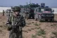 Turkish and Russian soldiers patrol near the town of Darbasi