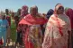 Sudanese refugees displaced by the conflict in Sudan gather 
