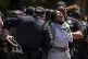 A pro-Palestinian protester yells ‘Free Palestine’ as sh