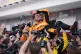 McLaren driver Lando Norris is lifted after winning the Miam