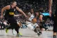 Minnesota Timberwolves guard Anthony Edwards (centre) drives