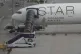 The Boeing 777-300ER aircraft of Singapore Airlines, is park