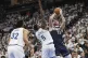 Dallas Mavericks guard Luka Doncic (77) shoots against Minne