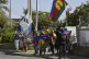 People demonstrate as French President Emmanuel Macron's mot