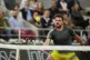 Switzerland's Stan Wawrinka plays a shot against Britain's A