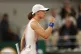 Poland's Iga Swiatek reacts during her first round match aga
